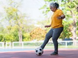 Women walking football