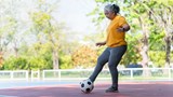 Women walking football
